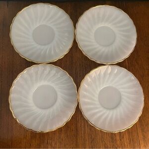 (4) Vintage Anchor Hocking milk glass saucer with gold trim.